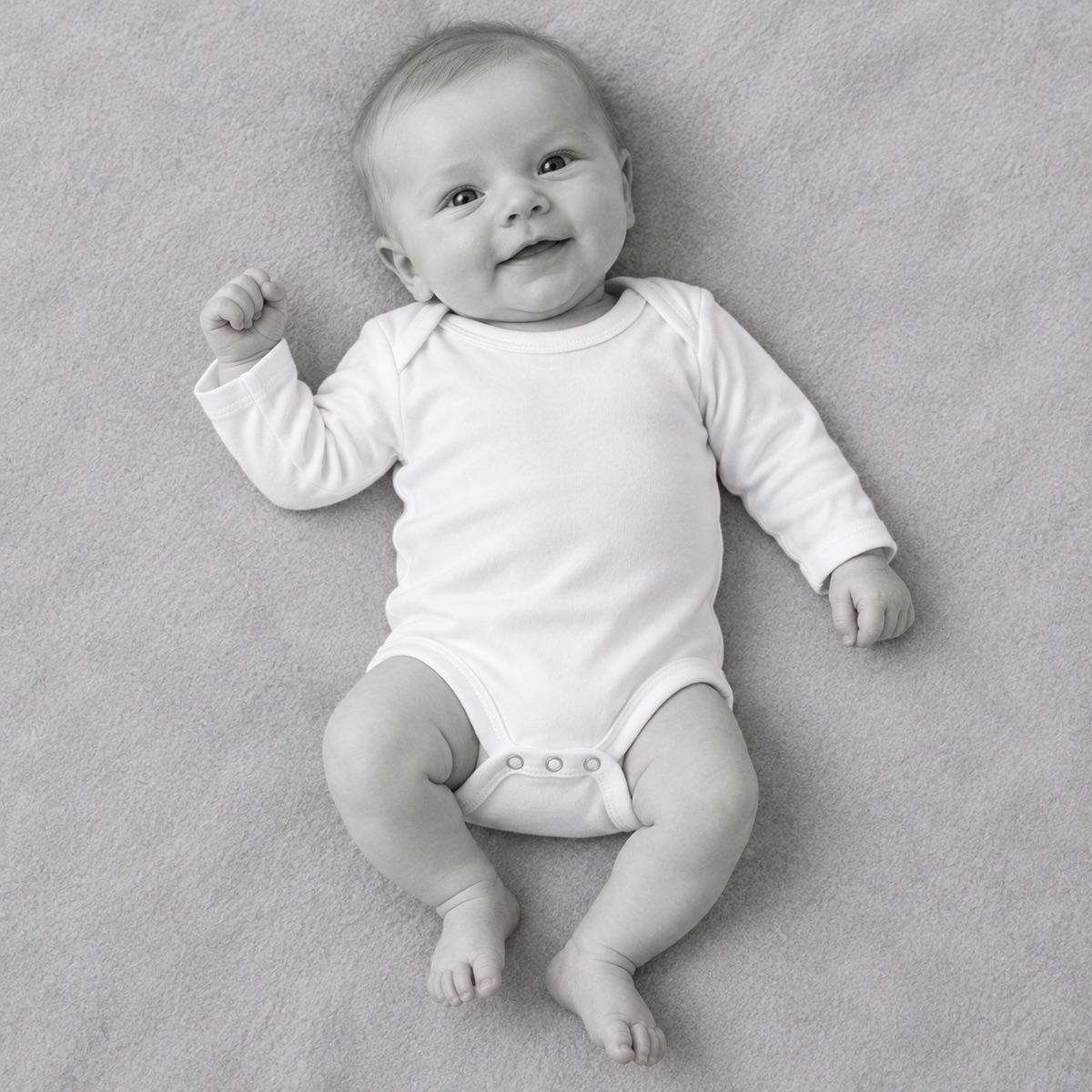 A plain white long-sleeve baby bodysuit, ready to be printed with your own creation