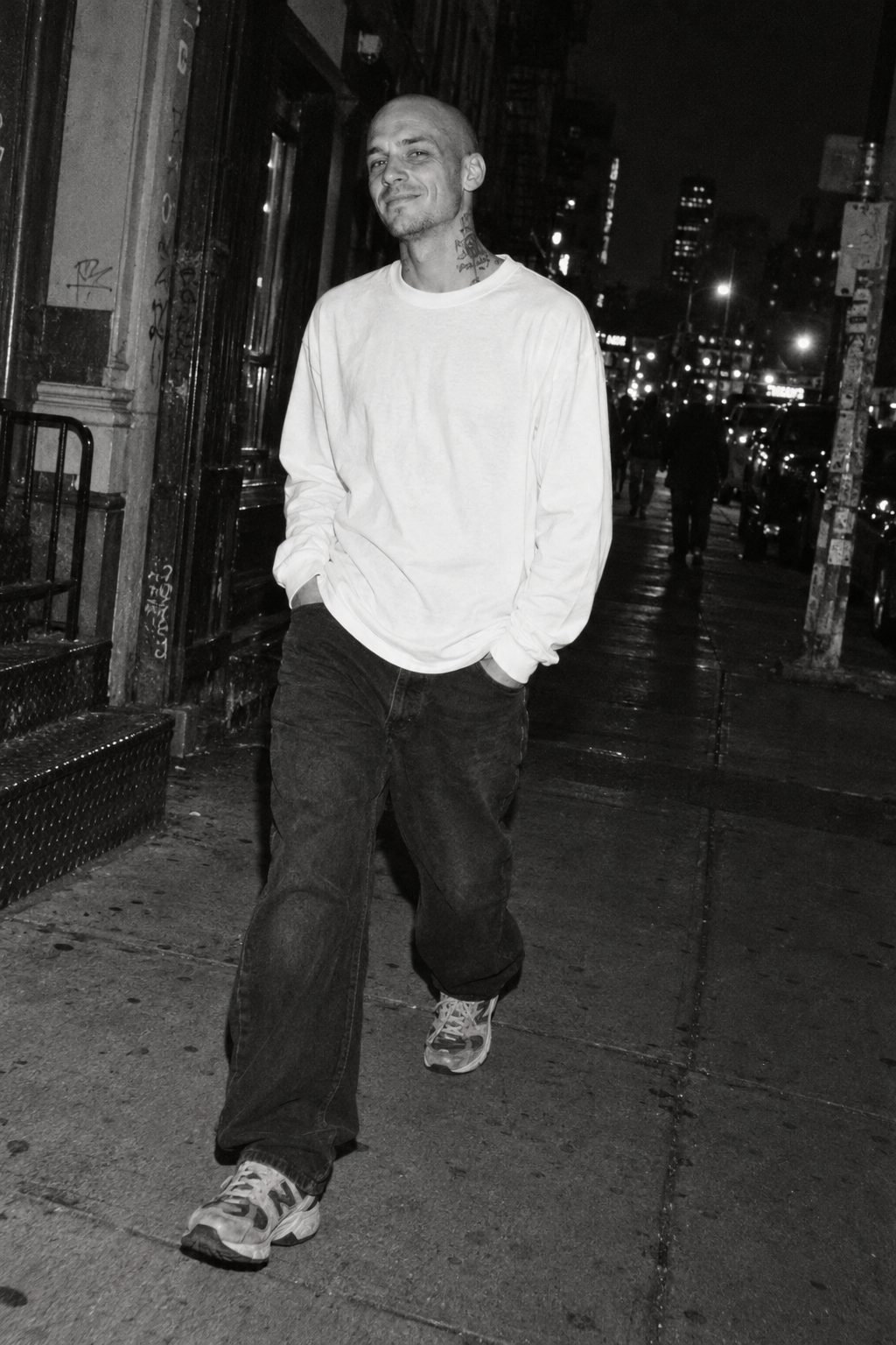 Model wearing a white Eye Heart Blank long sleeve shirt