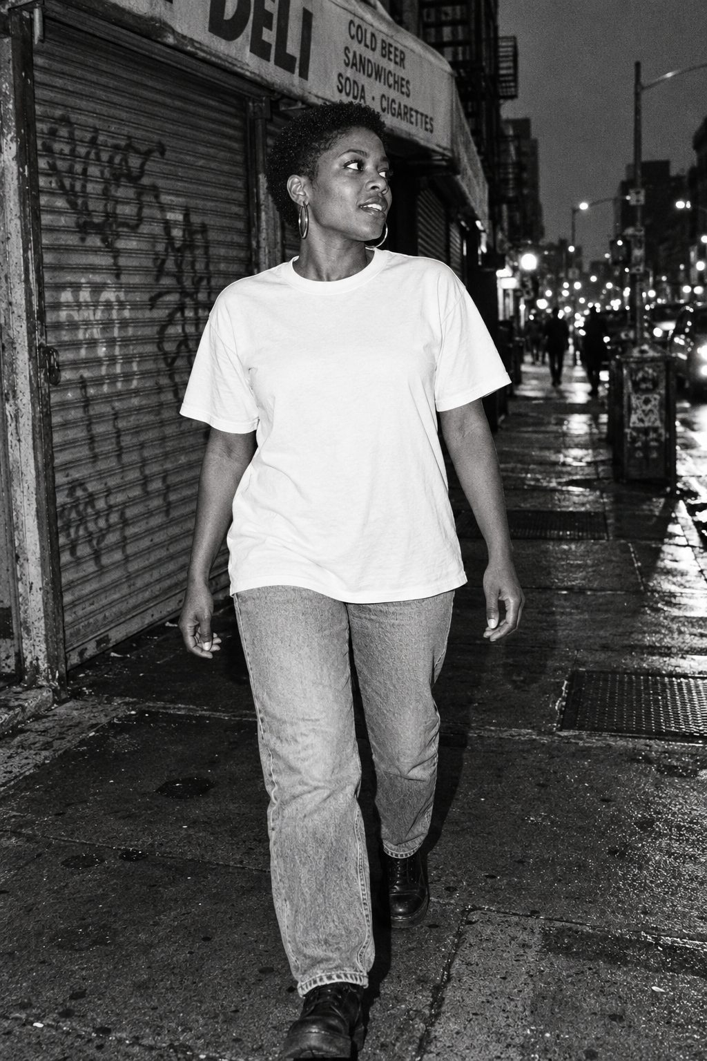 Model wearing a plain white unisex crewneck t-shirt, ready to be printed with your own creation
